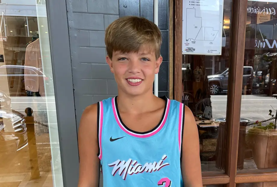 Image shows a smiling boy.