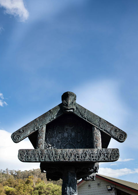 An intricately carved Māori pātaka. 