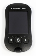 Long and narrow black metter with incurved sides and 3 buttons.